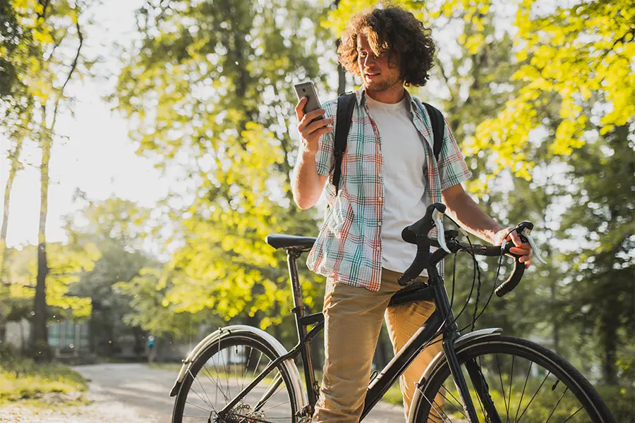 Bike rider searching for a local business on maps app