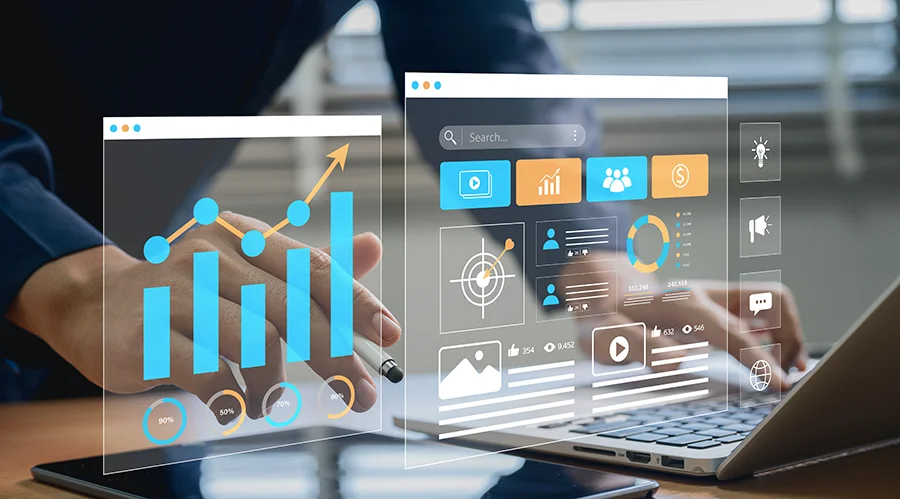 Marketing team analyzing digital dashboards showing real-time marketing data and revenue insights through AI-powered automation